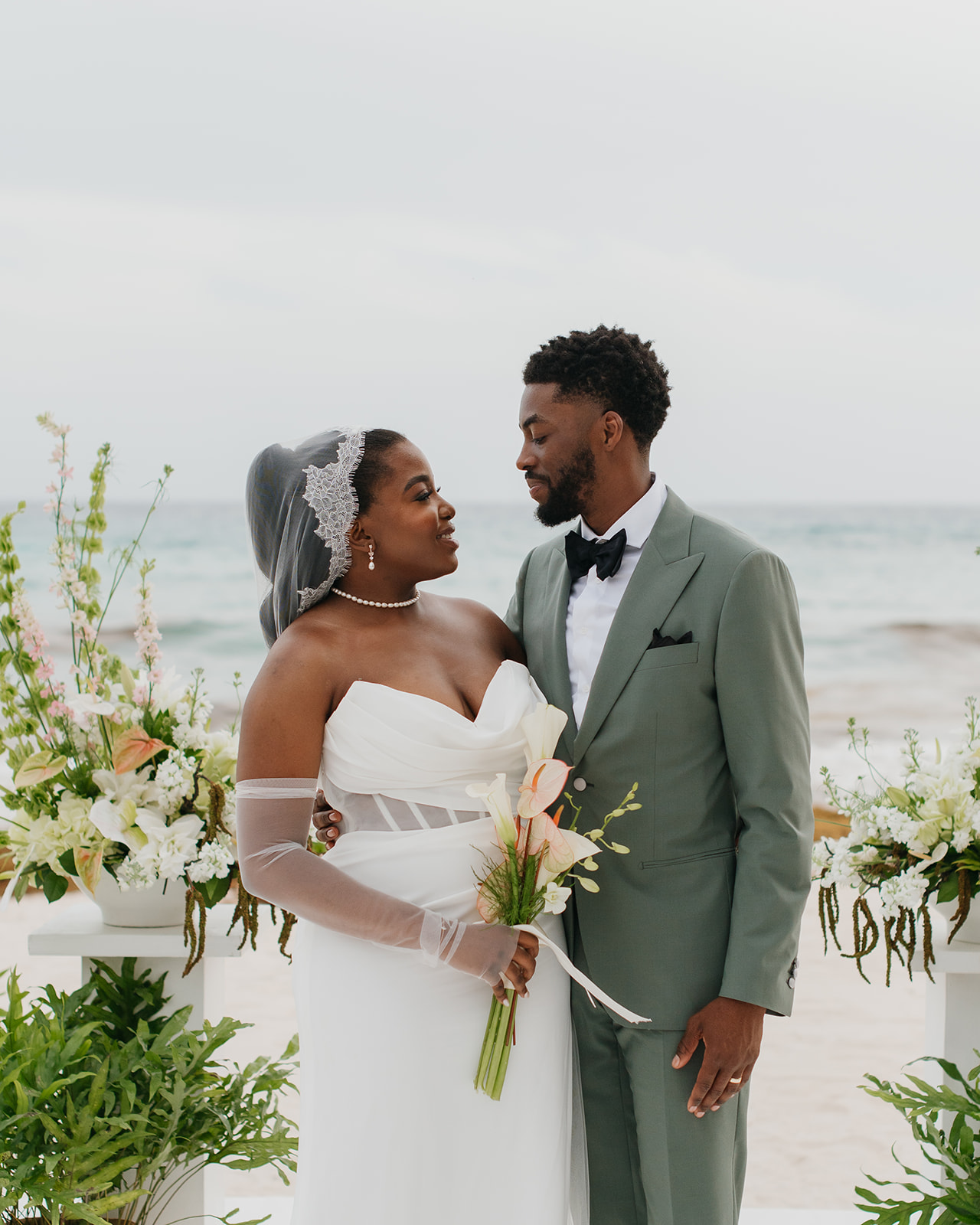A couple sharing a quiet moment during their destination wedding in Barbados