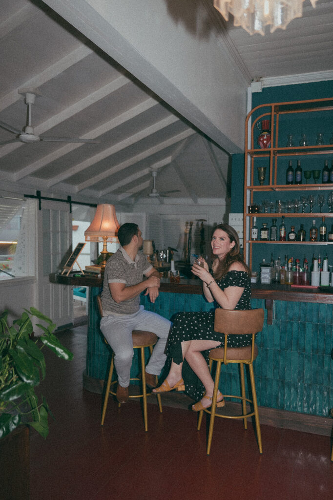 Candid flash photo of a couple dancing at a bar
