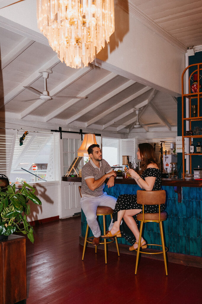 Candid flash photo of a couple dancing at a bar

