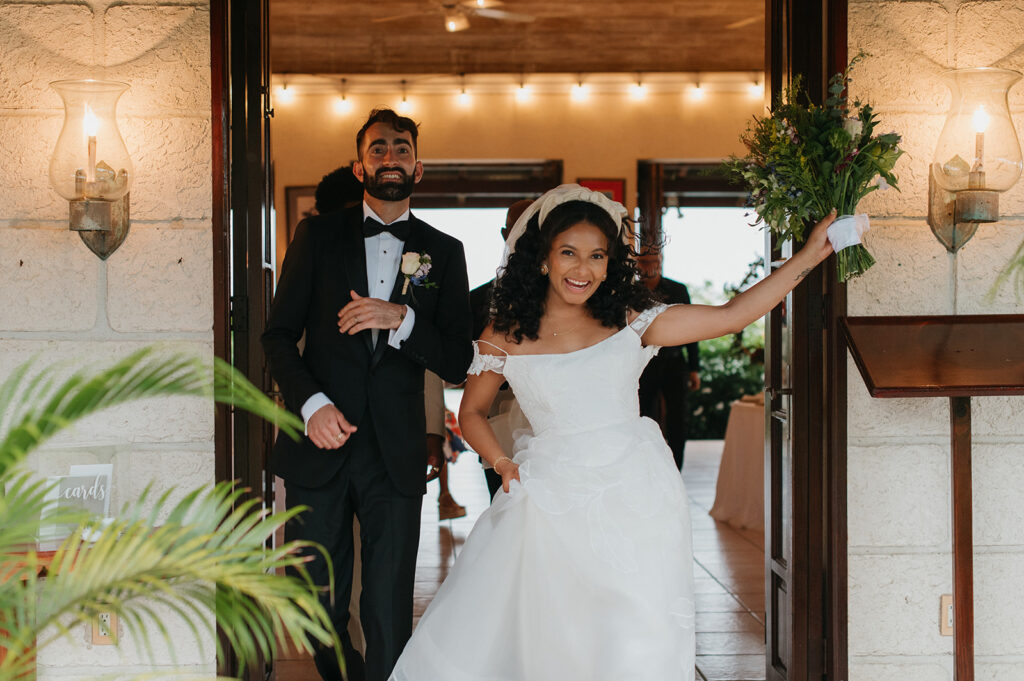 Intimate wedding ceremony with family and friends gathered outdoors
