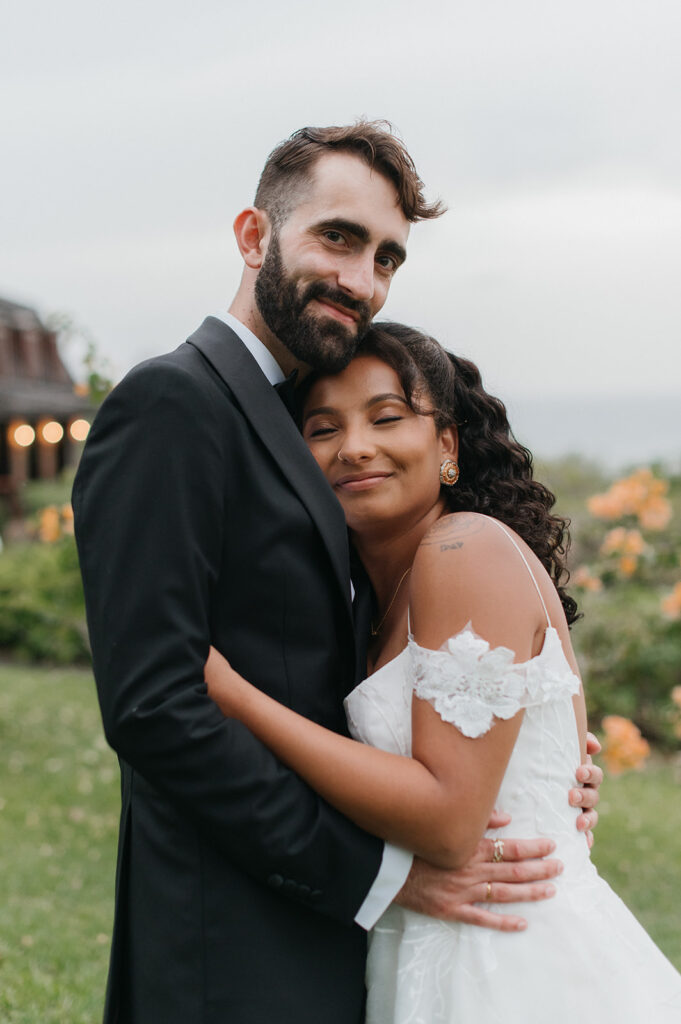 Wedding portraits in a tropical garden with colorful flowers
