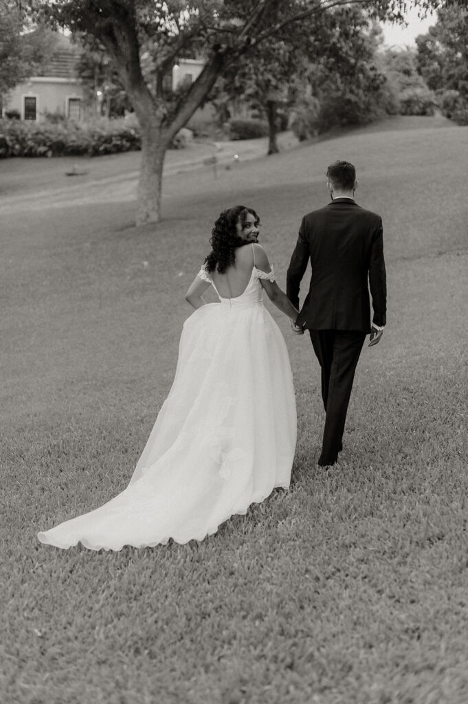 Wedding portraits in a tropical garden with colorful flowers - The villas at Stone Haven
