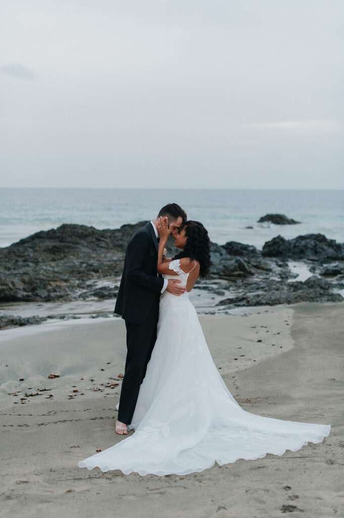 Couple sharing a quiet moment away from the crowd during their wedding
