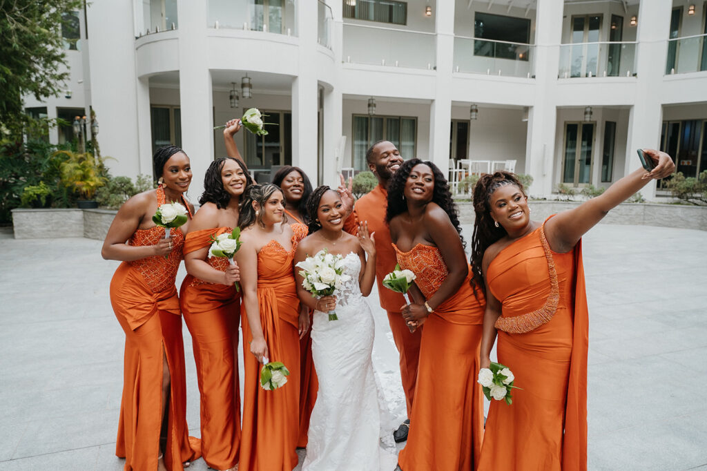 Romantic outdoor wedding ceremony surrounded by greenery.
