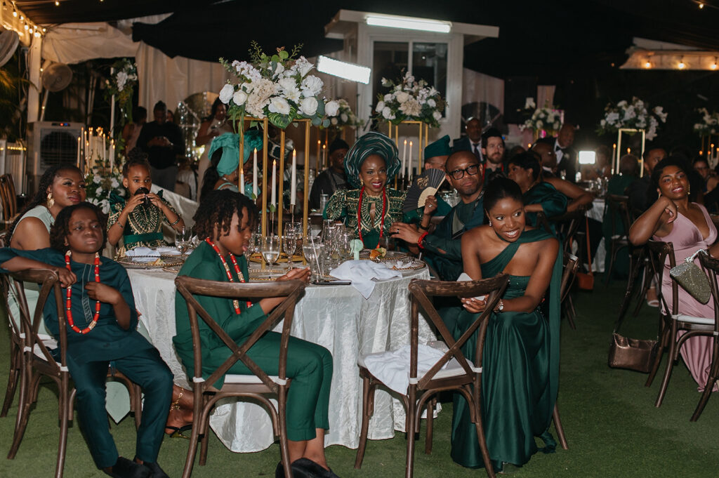 Wedding reception under the moonlight at Estate 101 with guests celebrating.
