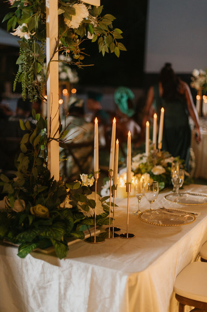 Decorated outdoor reception setup at Estate 101 with elegant table settings.