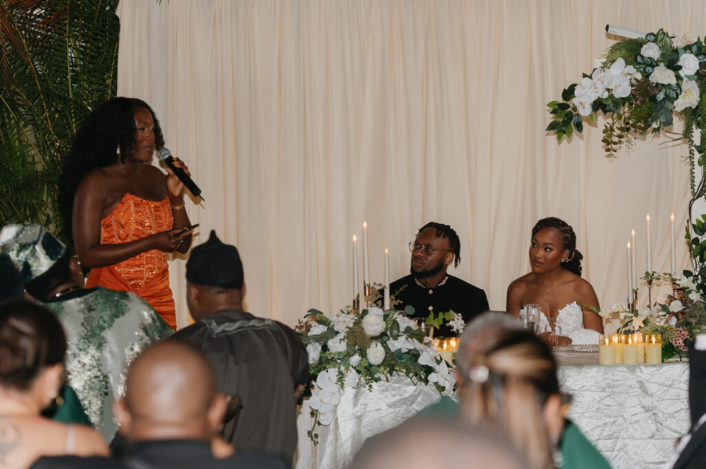 Guests gathered around outdoor tables during a wedding reception at Estate 101.