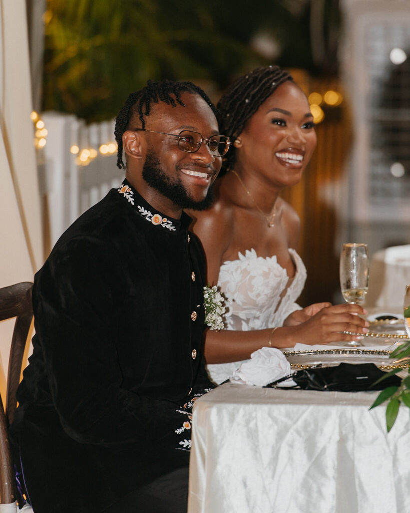 Bride and groom sharing a candid moment in the gardens of Estate 101, Trinidad.
