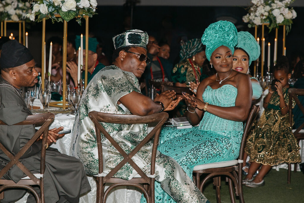 Guests gathered around outdoor tables during a wedding reception at Estate 101.