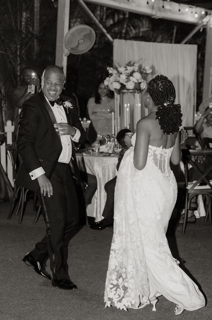 Wedding reception under the moonlight at Estate 101 with guests celebrating.
